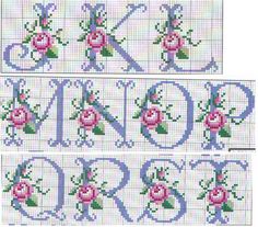 three cross stitch letters with roses on them