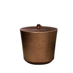 a large metal pot with a lid on it's side, against a white background