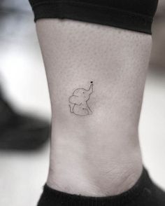 small elephant tattoo on the ankle