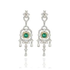 This is part of Chairish’s Fine Jewelry assortment.  Emerald and diamond chandelier earrings to make a statement with your look. These earrings create a sparkling, luxurious look featuring octagon cut gemstone. If you love to gravitate towards unique styles, this piece of jewelry is perfect for you.  PRODUCT DETAILS :-  > Material - 14K Solid White Gold > Gemstone - Emerald  > Gemstone Weight - 1.43 ct > Gemstone Shape - Octagon  > Gemstone Pcs - 2 > Gemstone Size - 5 x 5 mm > Diamond Weight - 4.58 ct > Diamond size - Mix  > Gross Weight - 11.742 Grams > Setting - Prong setting > Length - 53 mm  > Width - 15 mm Elegant Octagon Earrings For Formal Occasions, Elegant White Gold Octagon Earrings, Octagon-shaped Diamond Earrings For Formal Events, Octagon Diamond Earrings For Formal Events, Octagon Diamond Earrings For Formal Occasions, Formal Octagon Diamond Earrings, Elegant Octagon-shaped Jewelry For Evening, Elegant Octagon Shaped Jewelry For Evening, Formal Octagon Earrings With Diamond Accents