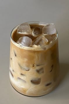 an iced drink in a glass with ice cubes