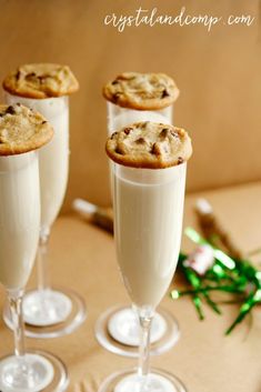 three glasses filled with cookies on top of each other