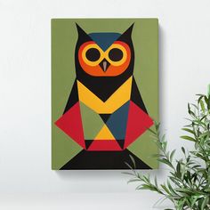 an owl painting on a wall next to a potted plant