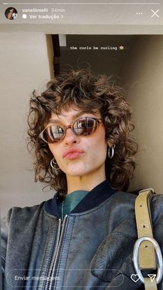 to keep you looking stylish and on-trend all season long. #fallhaircutsformen #menhairstyles Female Curly Mullet, 70s Perm, Mullet Curly Hairstyle Women, Curly Hair Alternative, Short Curly Mullet Women, Short Curly Wolf Cut With Bangs, Short Curly Mullet Hairstyle Women, Short Cut Curly Hair, Curly Short Hair Women