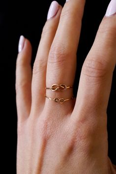 Modern Twist Infinity Stackable Rings As Gift, Adjustable Infinity Stackable Rings With A Modern Twist, Adjustable Infinity Stackable Anniversary Rings, Adjustable Infinity Stackable Rings For Anniversary, Adjustable Infinity Stackable Rings, Dainty Infinity Stackable Rings For Gift, Dainty Infinity Stackable Rings As Gift, Rose Gold Stackable Infinity Jewelry, Dainty Infinity Midi Rings For Gift