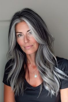 Women over 50, these elegant silver hair ideas are for you! From gorgeous black and gray hair blends to flattering silver highlights, there are over 40 examples to explore on our blog. Click the pin to see the article now and save your favorite looks! Annika Von Holdt, Long Grey Hair, Black And Grey Hair, Silver Hair Highlights, Scene Girl, Salt And Pepper Hair