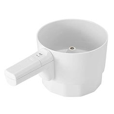 a white cup with a remote control attached to the inside of it, on a white background