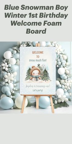 a snowman boy welcome sign with balloons in the background