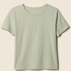 Nwt Gap Organically Grown Cotton Crewneck Tee Light Sage Green Crewneck, Straight Silhouette Short Sleeves 100% Soft Organically Grown Cotton Lightweight Machine Wash, Tumble Dry 18” Between Underarms 20” Across Hemline Length Approximately 25” Same Or Next Day Ship Consistent 5 Rated Seller Downsizing Due To Move- Lots To Go! Gap Summer T-shirt For Everyday Wear, Gap Green Cotton Tops, Green Cotton Gap Tops, Green Cotton Tops From Gap, Green Cotton Tops By Gap, Gap Basic Summer Tops, Gap Trendy Relaxed Fit Tops, Gap Relaxed Fit Trendy Tops, Fitted Gap T-shirt For Everyday