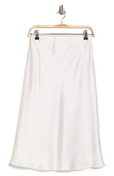 Elevate your wardrobe with this pull-on bias satin midi skirt for elegant, feminine style. 31" length (size S) Elasticized waist Pull-on style Satin construction 97% polyester, 3% spandex Machine wash cold, line dry Made in USA Model’s stats for sizing: 5’10” height, 34” bust, 27” waist, 35” hips. Model is wearing size S. White Satin Skirt For Spring, White Satin Skirt For Summer, Spring Formal Satin Maxi Skirt, Spring Relaxed Bias Cut Maxi Skirt, Spring Bias Cut Relaxed Maxi Skirt, Spring Relaxed Fit Bias Cut Maxi Skirt, Fitted White Satin Maxi Skirt, White Satin Flared Maxi Skirt, White Satin Skirt With Flowy Fit