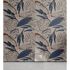 an abstract wallpaper with blue and red leaves on white background, in the corner of a room