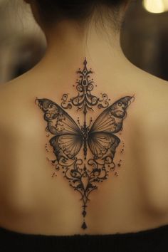 Intricate butterfly tattoo with floral designs on a person's upper back. Best Back Tattoos For Women, Dainty Spine Tattoo, Back Tattoo Designs For Women, Back Tattoo Inspiration, Best Back Tattoos, Back Tattoo Placements, Back Tattoos For Women, Back Tattoo Designs, Feminine Back Tattoos