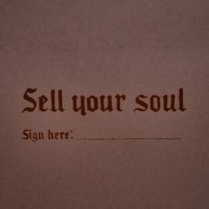 a sign that says sell your soul on it