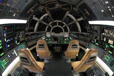 the inside of an airplane cockpit with leather seats