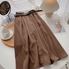 Style: commuting Size: one size Color: coffee, apricot, khaki, black, blue Beige Solid Color Skirt For Office, Beige Skirt For Office, Beige Solid Color Office Skirt, Casual Brown Solid Color Skirt, Brown Office Skirt With Pockets, Brown Solid Color Skirt For Fall, Chic Knee-length Pleated Skirt In Solid Color, Chic Knee-length Solid Color Pleated Skirt, Chic Solid Beige Skirt