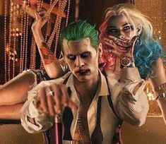 two people dressed up as the joker and harley in a scene from batman movie poster