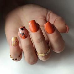 For a more elegant look, these nails feature a soft orange color with a pumpkin design on one accent nail. The design is complemented by gold leaf details on another nail, adding a touch of luxury to the overall look. Photo credit by: https://www.instagram.com/p/Cyq4hYfpfVB/ Fall Pumpkin Nails, Spice Nails, Pumpkin Nail Designs, Pumpkin Spice Nails, Pumpkin Nail Art, Oval Shaped Nails, Nail Base Coat, Simple Fall Nails, Sally Hansen Nails