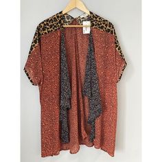 Umgee Semi-Sheer Mixed Animal Print Kimono Cardigan Women's Size M/L Beachy Cover-Up Boho. In Excellent Condition! No Flaws Flat Lay Measurements: Shoulder - ~36 Bust -~35 Length - 31" *Please Contact Me With Any Concerns Or Problems With Your Transaction. I Will Try My Best To Resolve The Problem.* Thank You! Be Sure To Check Out My Other Listings For Deals That May Appeal To You. Summer Casual Printed Cardigan, Casual Printed Summer Cardigan, Brown V-neck Summer Cardigan, Casual Wrap Cardigan For Beach Cover-up, Casual Open Front Printed Cardigan, Printed Beach Cardigan, Summer Open Front Printed Cardigan, Beach Printed Open Front Cardigan, Oversized Summer Cardigan For Layering