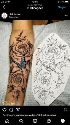 a tattoo with roses and a butterfly on the arm, next to a piece of paper