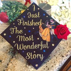 a graduation cap that says i just finished the most wonderful story