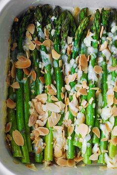 asparagus and almonds in a casserole dish ready to be eaten