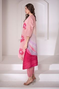 Light pink kaftan with floral print on front and abstract print on back. Paired with a plain textured straight pant. - Aza Fashions Pink Sets With Printed Motifs For Spring, Pink Straight Kurta Sets For Spring, Pink Floral Print Sets For Daywear, Pink Spring Sets With Printed Motifs, Casual Pink Printed Kaftan, Pink Printed Short Sleeve Kaftan, Traditional Pink Floral Print Kaftan, Pink Printed Festival Kaftan, Pink Floral Print Cotton Kaftan