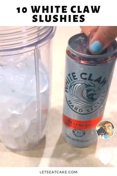 a can of white claw slushies next to a glass with ice cubes in it