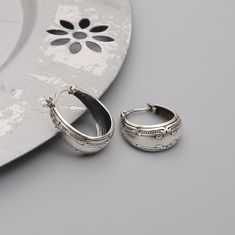 "READY TO SHIP Size:  L : 0,79\" | W : 0,87\" ►925K sterling silver, they are tarnish free and waterproof, safe for sensitive skin. Perfect for everyday wear. ► In order for the products to be used longer without losing their properties,should be avoided contact with perfume, water and liquid chemicals. ► Each purchase will arrive packaged ready to give as a gift, in a protective box. ► You can leave a special message that you want written in the box during checkout. ► Material Content: 925K Ste Elegant Round Earrings With Artistic Design, Silver Artisan Earrings With Artistic Design, Artisan Silver Earrings With Artistic Design, Silver Oval Single Earring, Bohemian Silver Round Clip-on Earrings, Artistic Silver Hoop Earrings As Gift, Silver Bohemian Round Clip-on Earrings, Artistic Silver Metal Hoop Earrings, Artistic Nickel-free Hoop Earrings