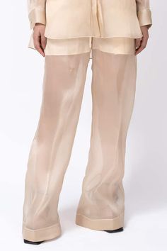 Beige organza silk straight trouser with white piping detailing. - Aza Fashions Sheer Beige Bottoms For Spring, Sheer Beige Bottoms For Summer, Chic Sheer Trousers, Sheer Chic Pants For Spring, Elegant Sheer Pants For Spring, Chic Organza Party Bottoms, Sheer Trend, Trouser Pattern, Leh