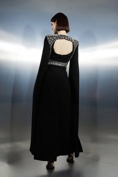 the back of a woman's dress in black