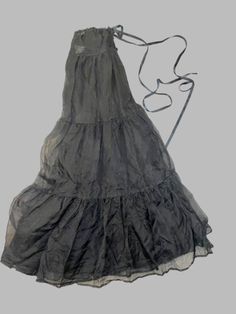 Sheer Silk Organza Skirt with volumes of fabric, special stitching, tie waist, and button loop closure. Vintage Inspired from a late 1800’s petticoat skirt. Volumes of fabric, tie waist, raw edges, and special stitches keep it authentic to the original. One size fits most, up to 38" waist. Best Seller. Item sells fast, if out of stock, please allow up to 3 weeks for delivery. Black Long Ruffled Skirt Petticoat, Black Vintage Ruffled Skirt, Black Long Ruffled Petticoat, Black Tiered Skirt In Crinoline, Petticoat Skirt, Organza Skirt, Silk Organza, Vintage Textiles, Black Silk