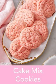 pink cake mix cookies on a white plate