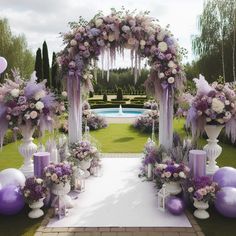 an outdoor wedding setup with purple and white flowers