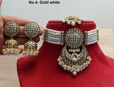 *Light Weight kundan choker necklace set. *Beautiful & Light in weight. *Necklace width: 1 inches (included drops) *Earrings length: 2.8 inches  (with drops)   *Earrings Stud diameter : 1.2 inches White Kundan Choker With Hand-set Details, Heavy White Choker As Gift, Heavy White Kundan Necklace, Heavy White Round Kundan Necklace, White Choker For Diwali, Traditional White Hand Set Choker, Heavy White Bridal Choker Necklace, Festive White Round Choker, White Kundan Choker Jewelry Set