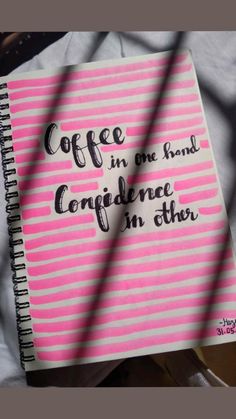 a notepad with the words coffee in one hand, confidence in other