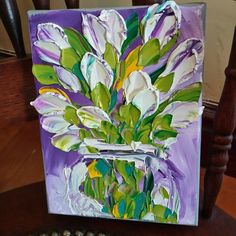 an acrylic painting of white flowers in a vase on a purple and green background