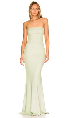 Find KATIE MAY Mary Kate Gown on Editorialist. Katie May Mary Kate Gown in Sage. - size XS (also in 6, L, M, S, XL, XXL) Katie May Mary Kate Gown in Sage. - size XS (also in 6, L, M, S, XL, XXL) Self: 98% poly 2% spandex Lining: 100% poly. Made in USA. Dry clean only. Fully lined. Hidden side zipper closure. Back draped cut-out. Mid-weight crepe fabric. Neckline to hem measures approx 57 in length. KATR-WD199. MWAC0095K. After receiving international praise for designing her younger sister's wed Strapless Fitted Silk Gown, Formal Strapless Gown, Fitted Strapless Gown, Prom Dress Inspo, Semi Formal Outfits, Katie May, Revolve Dresses, Pretty Prom Dresses, Prom Outfits