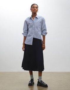 Slip into this midi skirt by Finery London to bring a sophisticated touch to your outfit. It's crafted in a pleated style to offer movement through the fabric as you walk. A zip fastening at the side ensures a secure fit. Pleated Skirt Midi Outfits, Navy Midi Skirt Outfit Summer, Navy Long Skirt Outfit, Pleated Wool Skirt Outfit, Midi Skirt Office Outfit, Pleats Skirt Outfit, Workwear Pleated Midi Skirt, Midi Skirt Work Outfit, Navy Pleated Skirt Outfit