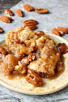 a plate with pecan bread and nuts on it