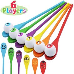 six different colored plastic spoons with faces on them and one has a ball in the middle