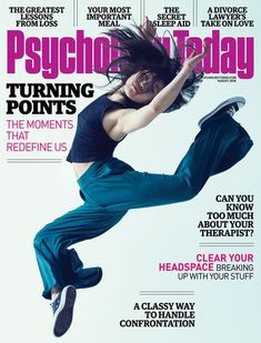 a woman jumping in the air on top of a magazine cover