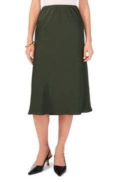 Glossy satin calls out the bias cut of a skirt that's easy to style up or down. 29" length Concealed-elastic waist Lined 100% polyester Machine wash, tumble dry Imported Bias Cut Skirt, Slip Skirt, A Skirt, Designer Wear, Fast Fashion, Skirt Length, Lifestyle Brands, Vince Camuto, Womens Bottoms