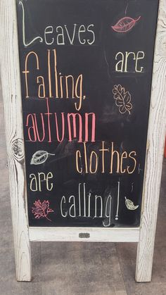 a chalkboard sign that says leaves are falling, autumn clothes are calling