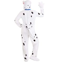 a man in a dalmatian costume is standing with his hands up and pointing at something