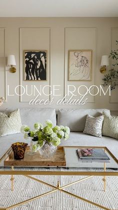 a living room with couches, tables and pictures on the wall above them that say i lounge room