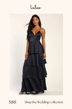 a woman in a long black dress with the words shop the wedding collection on it