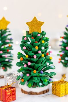 a small christmas tree sitting on top of a table