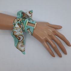 White and light green color satin scarf bracelet with a gold-tone buckle. This handmade ribbon you can use like hair, head, neck, or handbag accessories. A great gift idea for someone who loves handmade! Polyester ribbon size:        100×4.2 cm/ 39.4×1.65 in,        100×3 cm/ 39.4×1.18 in. Gold-tone metal buckle size:         2×2 cm/1.1×1.1 in,         2×3 cm/1.1×1.18 in. Product maintenance: * Wash gently by hand. Do you want to surprise someone you want to greet? Just send me that person's add Scarf Bracelet, Silk Wrap Bracelets, Wrap Headband, Headband Wig, Ribbon Wrap, Wrist Wrap, Headband Wigs, Scarf Tying, Silk Wrap