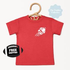 Free Shipping- always! Get ready for football season in Columbus, Ohio! Your toddler will look awesome cheering on his favorite team in the 'Shoe! Not seeing a design you like for gameday? Send us a message + let us know if we can can customize your vision! Thank you for supporting our small, toddler mama + family run business! We love being able to provide you with trendy designs to make your kiddo the coolest on the block! The Bella Canvas short sleeve tee for toddlers is a 100% Airlume combed Red T-shirt With Name Print For Game Day, Game Day Red T-shirt With Name Print, Red Name Print T-shirt For Game Day, Red Name Print T-shirt For Sports Events, Red Sports Fan T-shirt For Cheerleading, Red T-shirt With Name Print For Sports Events, Red Team Spirit T-shirt With Name Print, State Of Ohio, Retro Football Shirts