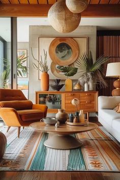 a living room filled with lots of furniture and large vases on top of them